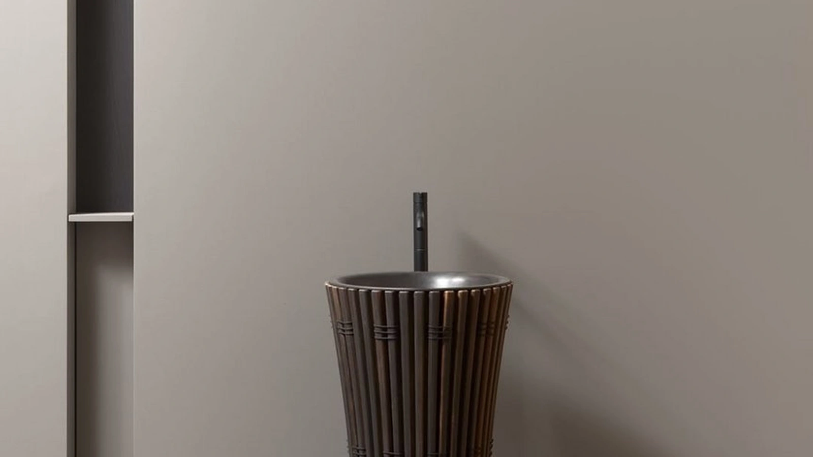 AMDL Circle Ramses freestanding washbasin in Moka Ash and dark patinated bronze by Antoniolupi