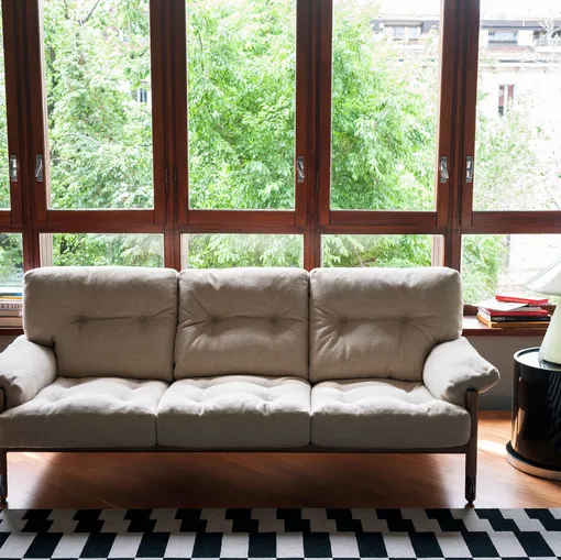 Linear fabric sofa in Sella by Tacchini