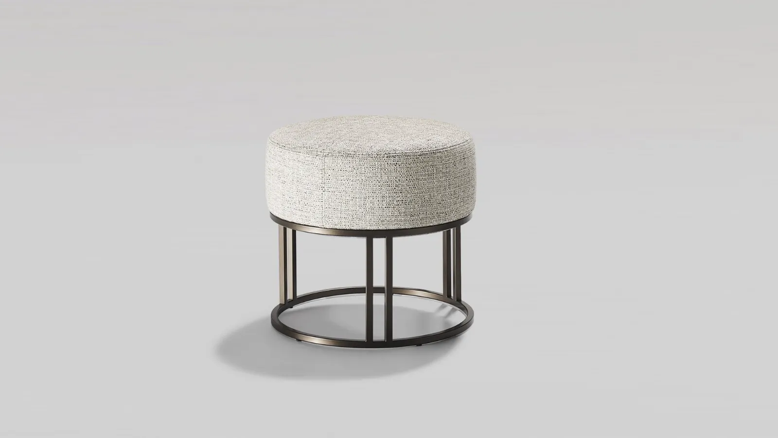 Orion pouf in fabric upholstery with a metal base by Twils.
