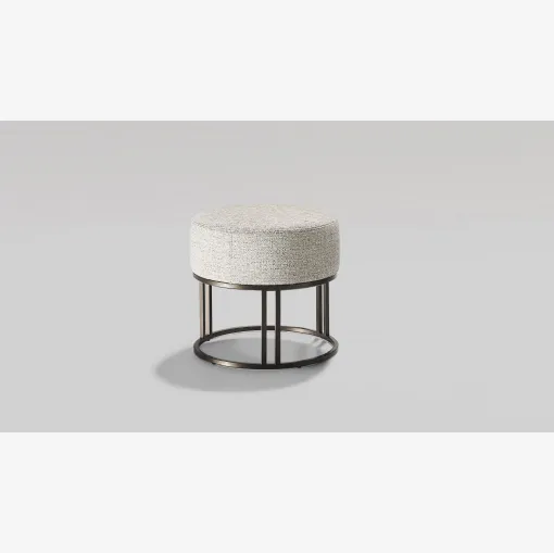 Orion pouf in fabric upholstery with a metal base by Twils.