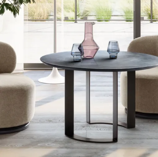Otto Breakfast small table in polished concrete by Twils.