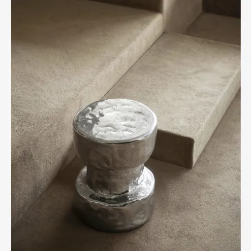 Aluminum coffee table Torso by Tacchini.