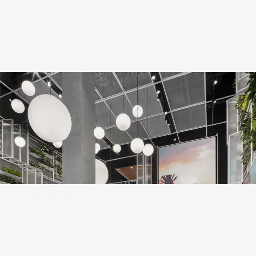 Yori Channel Arm lamp by Reggiani.