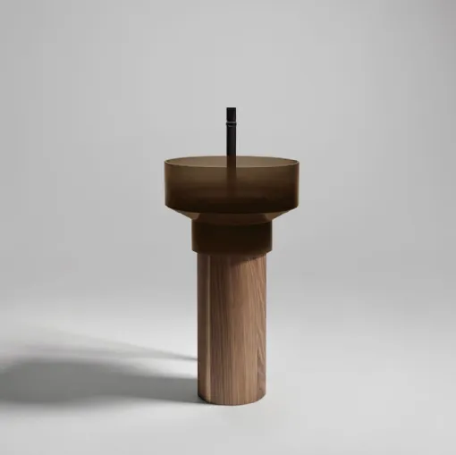 Borghi pedestal sink by Antoniolupi in glass and wood.
