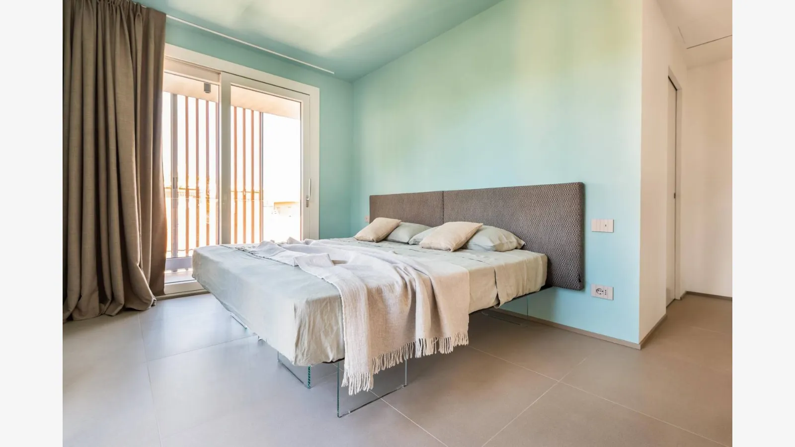 Air Bed 1507 with upholstered fabric headboard by Lago.