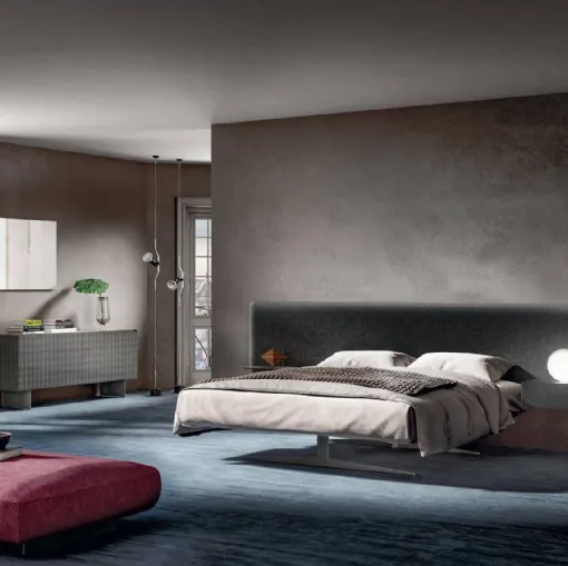 Steel bed 1747 with velvet upholstered headboard by Lago.