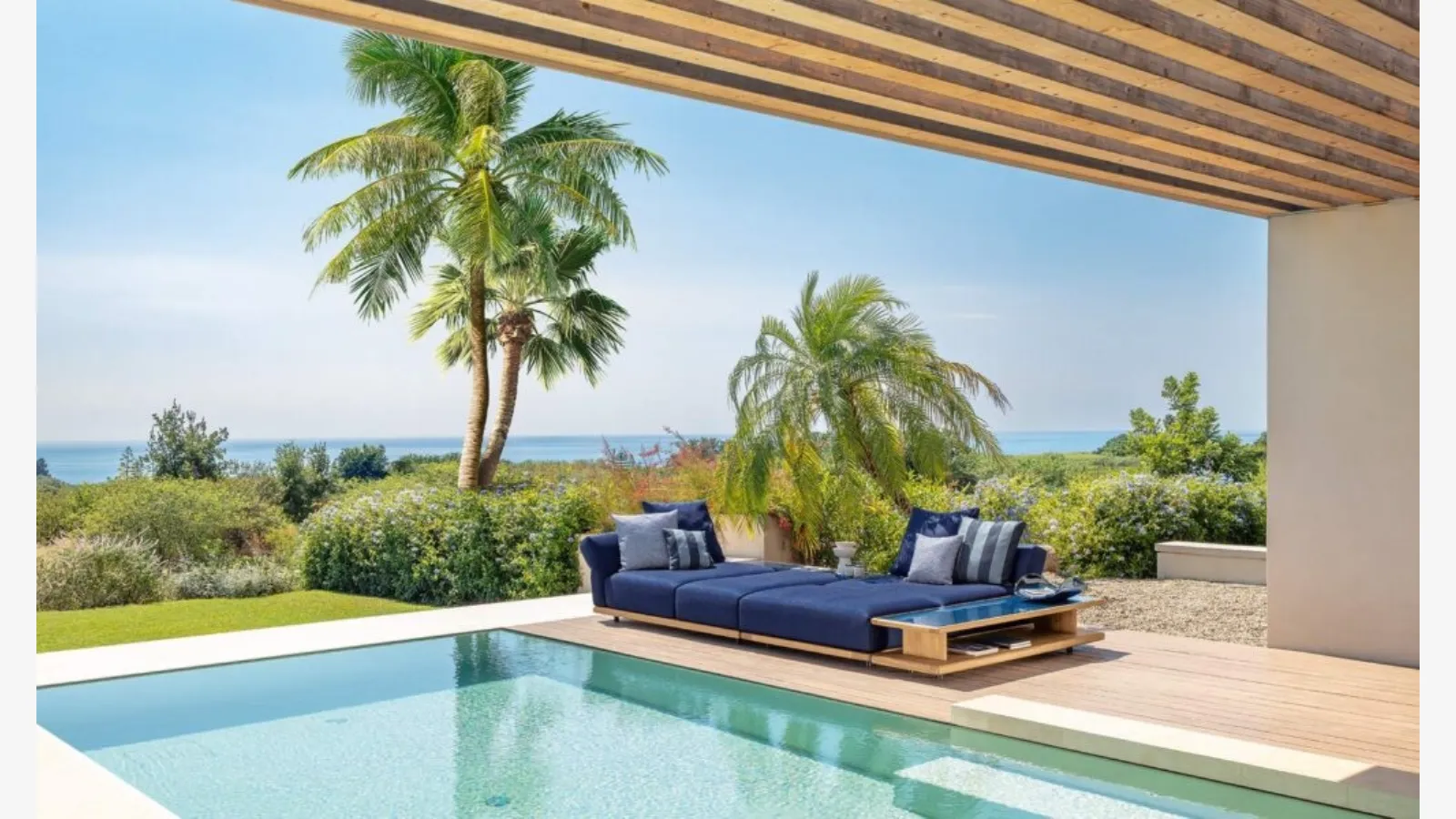 Elton sofa in padded fabric by Talenti.