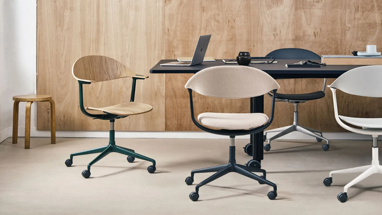 Mynt operational chair made of fabric, wood or plastic by Vitra.
